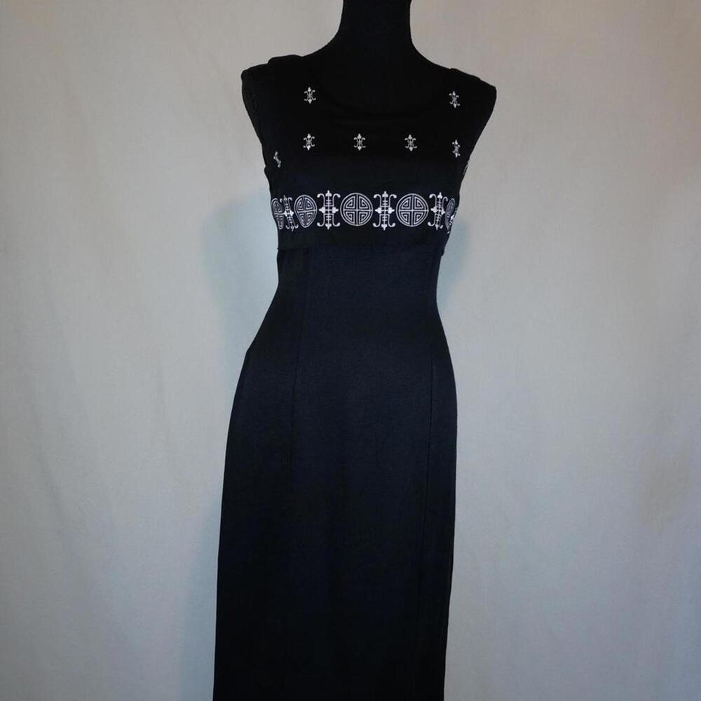 DJI back and white midi dress with detailed bodice and tie back